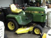 John Deere 318 used garden tractor with 38 inch mower deck and power steering