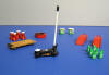 miniature creeper, jack, ramps, jack stands, oil pan, and oil