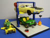 Miniature hoist with car, tractor, and gator